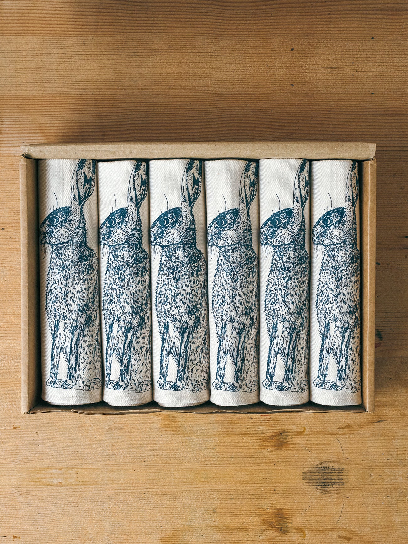 Blue Hare napkin gift set by Lottie Day – handmade cotton napkins with moon-gazing hare design, inspired by Norfolk wildlife