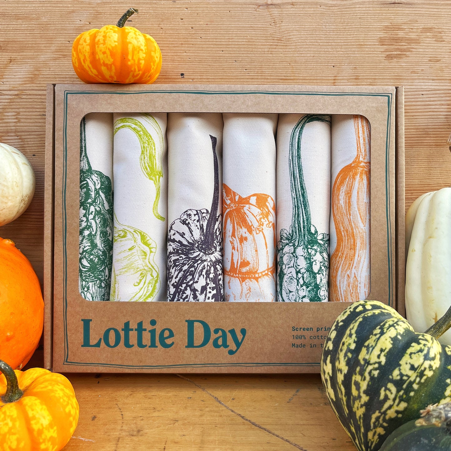 Squash napkin set by Lottie Day featuring six screen-printed designs inspired by Norfolk allotment squash varieties including Butternut and Turban