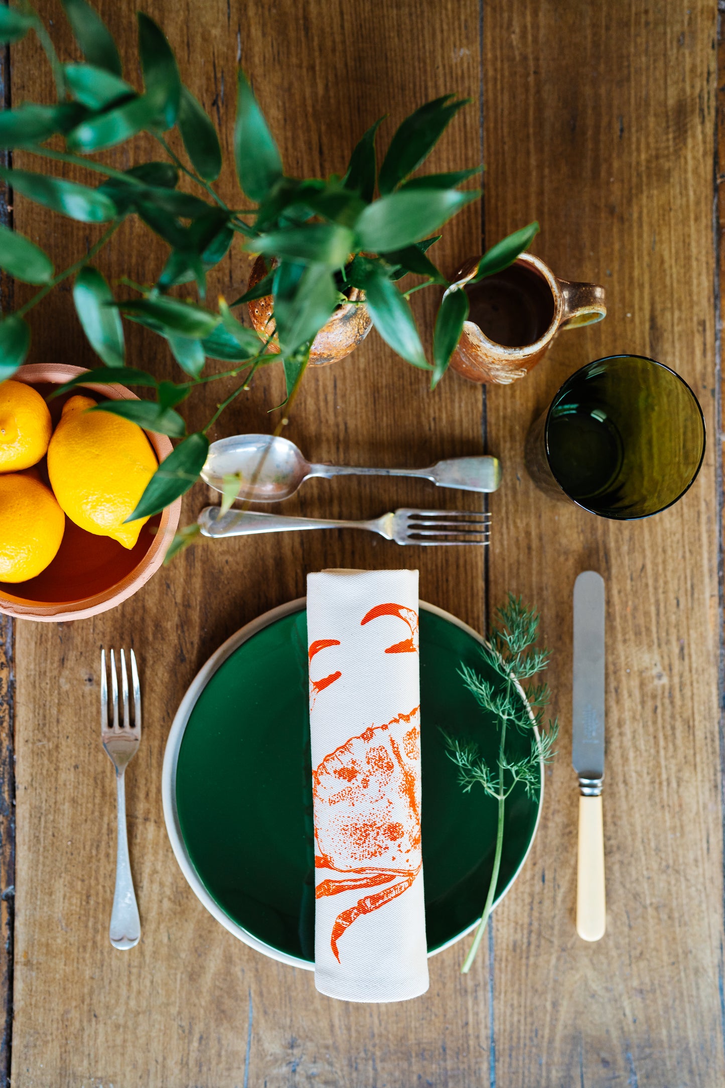 Seafood napkin gift set by Lottie Day featuring handprinted crab, blue lobster, prawn, mackerel, samphire and lemon illustrations on cotton napkins