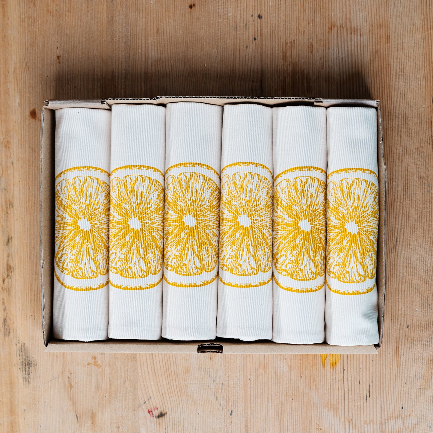 Lemon napkin gift set by Lottie Day – handmade cotton napkins with screen-printed yellow lemon design, made in Norfolk