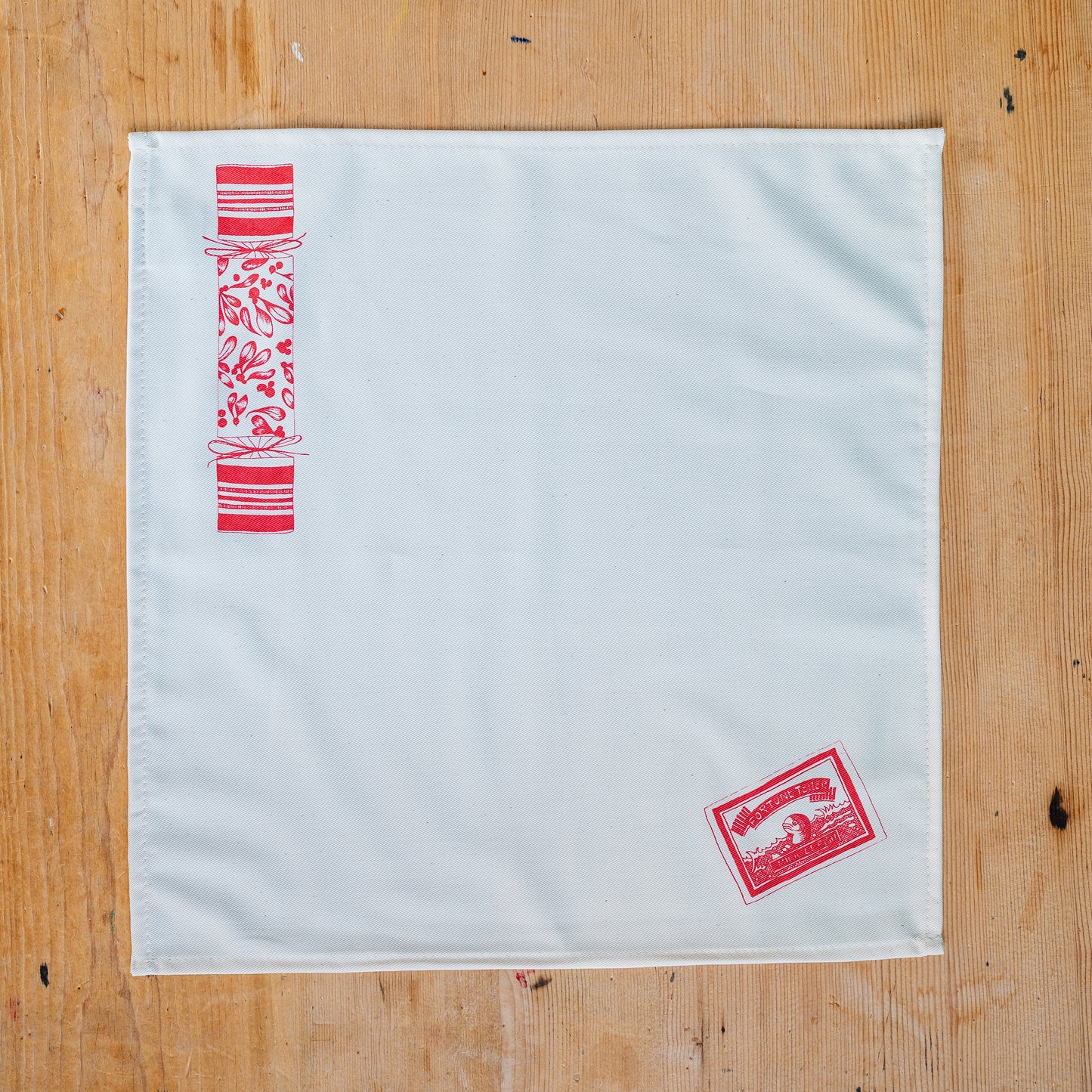 Christmas Cracker napkin set by Lottie Day – six cotton napkins with festive prints and hidden surprise designs