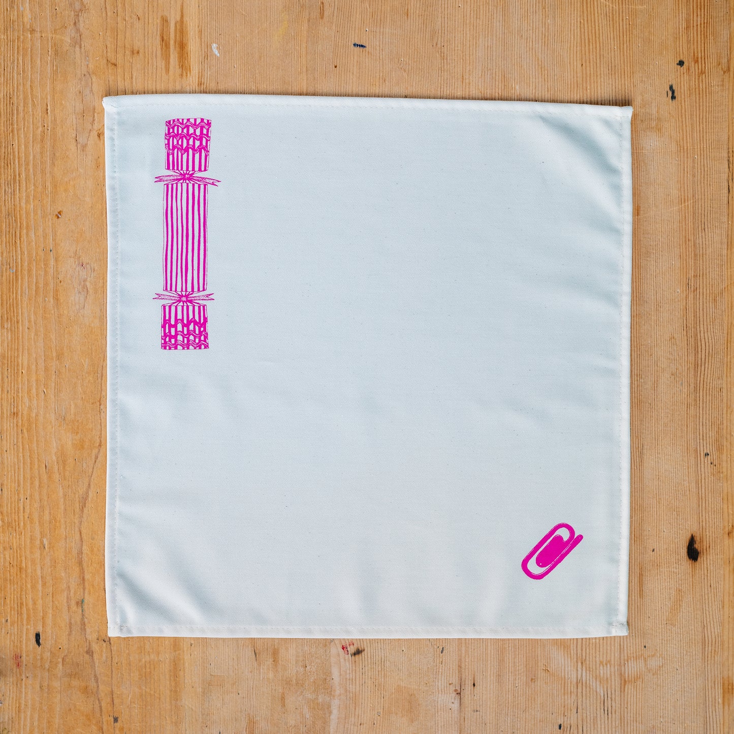 Christmas Cracker napkin set by Lottie Day – six cotton napkins with festive prints and hidden surprise designs