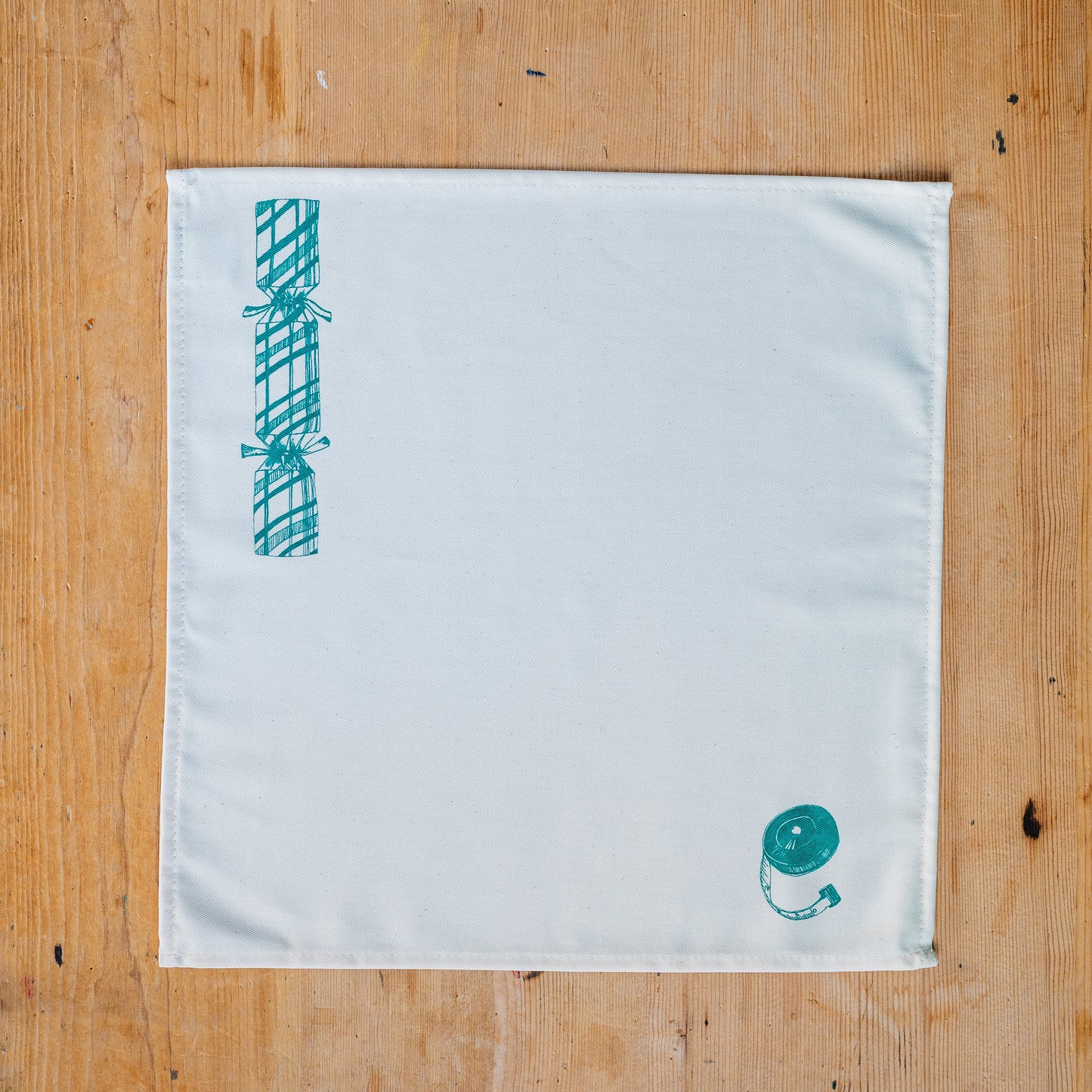 Christmas Cracker napkin set by Lottie Day – six cotton napkins with festive prints and hidden surprise designs