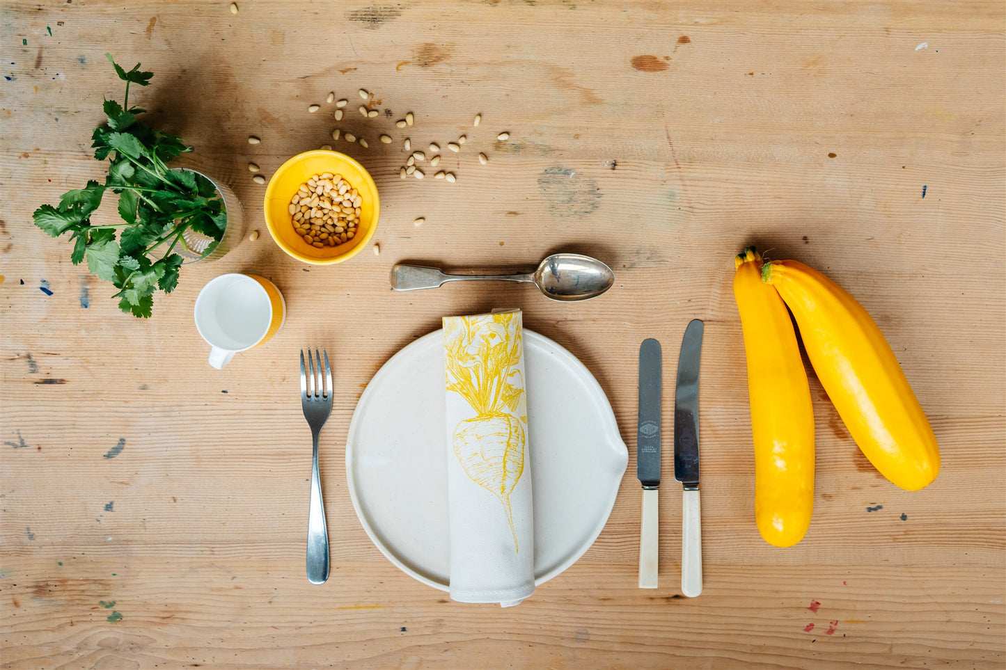 Allotment vegetable napkin set by Lottie Day - handmade cotton napkins featuring screen-printed garden vegetables including beetroot and leek