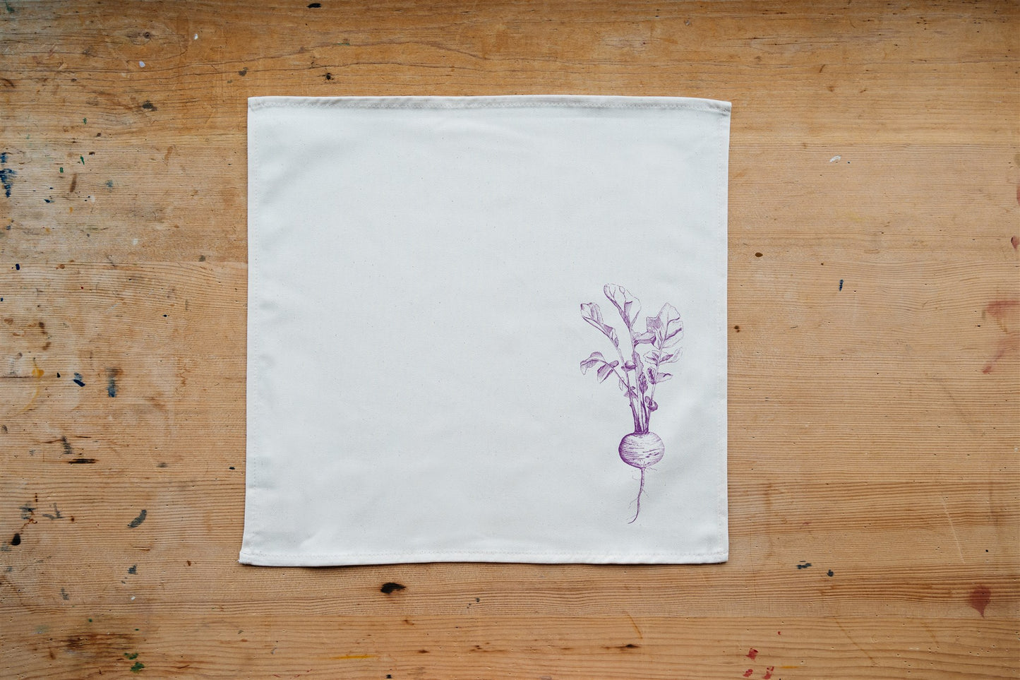 Allotment vegetable napkin set by Lottie Day - handmade cotton napkins featuring screen-printed garden vegetables including beetroot and leek
