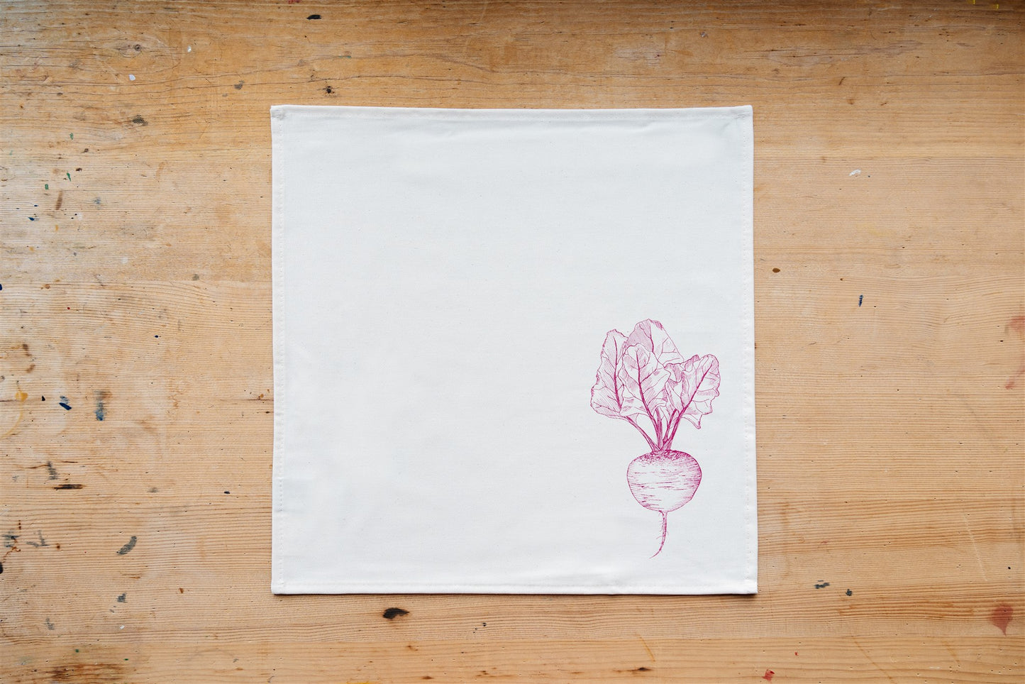 Allotment vegetable napkin set by Lottie Day - handmade cotton napkins featuring screen-printed garden vegetables including beetroot and leek