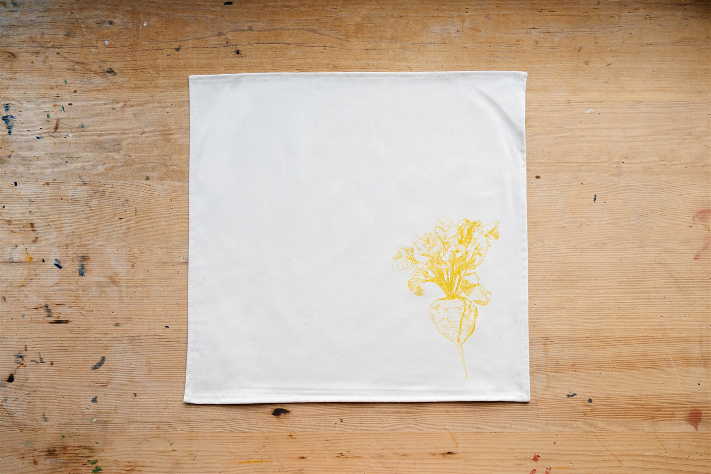 Allotment vegetable napkin set by Lottie Day - handmade cotton napkins featuring screen-printed garden vegetables including beetroot and leek