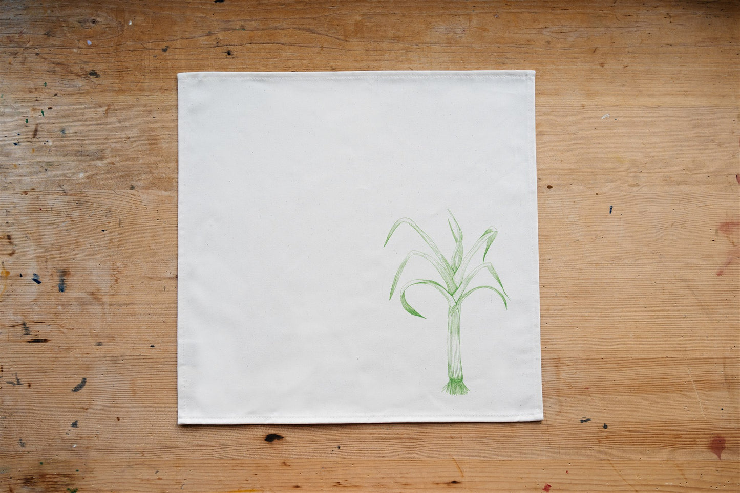 Allotment vegetable napkin set by Lottie Day - handmade cotton napkins featuring screen-printed garden vegetables including beetroot and leek