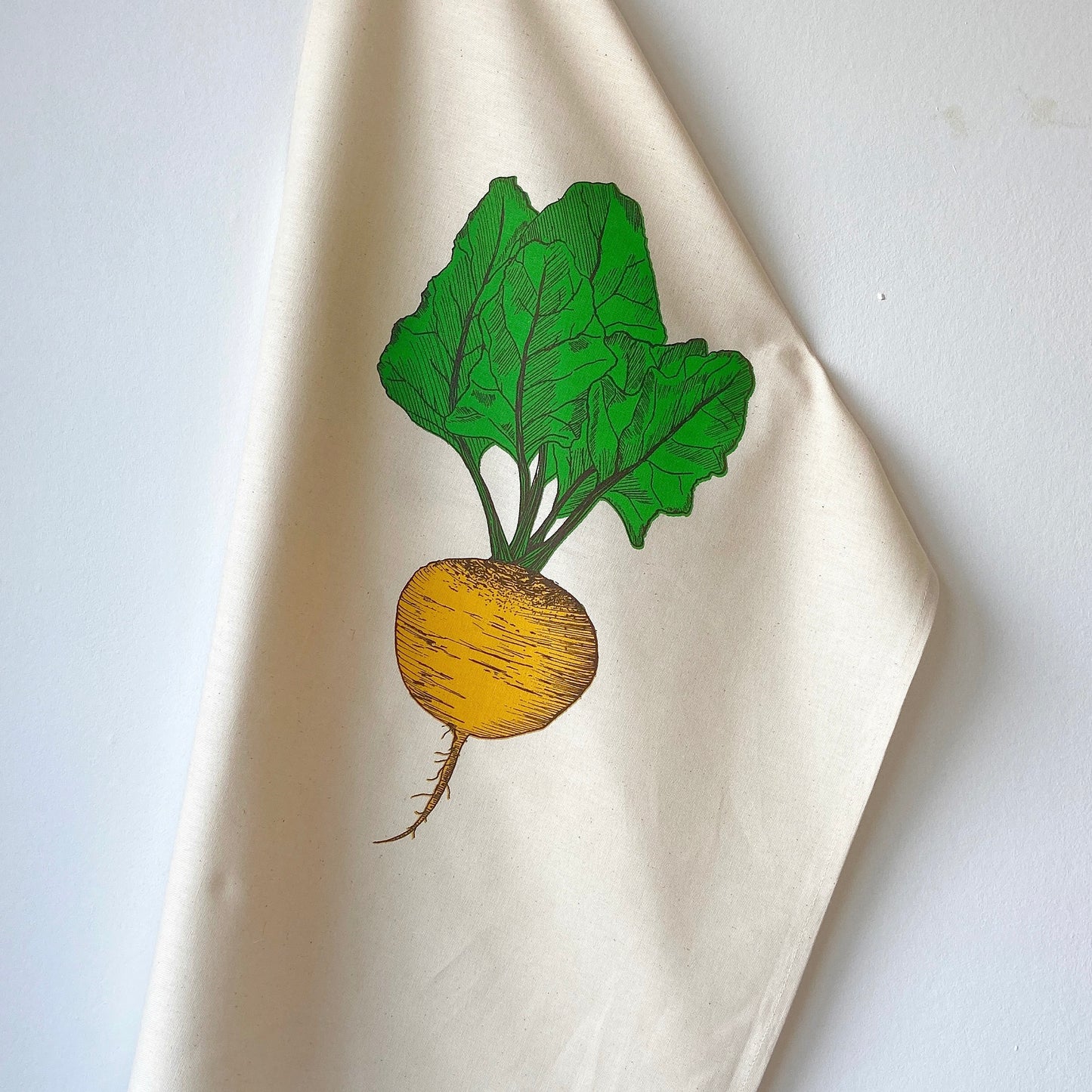 Golden Beet tea towel by Lottie Day – handprinted on cotton with allotment-inspired vegetable illustration, perfect for gardeners and cooks