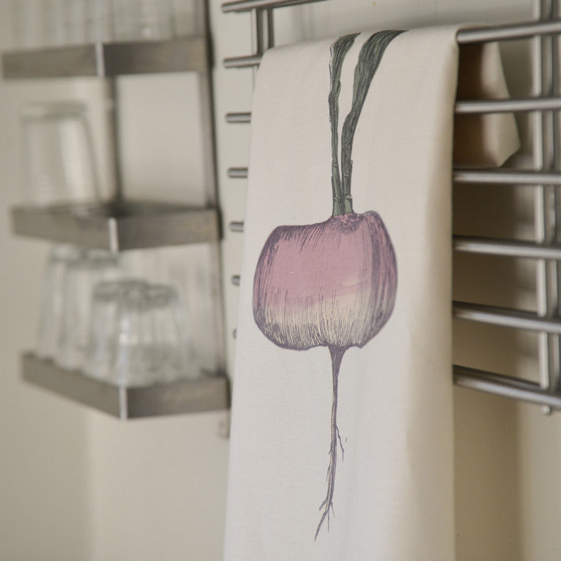 Purple Turnip tea towel by Lottie Day – hand-printed cotton kitchen towel with allotment-inspired root vegetable illustration