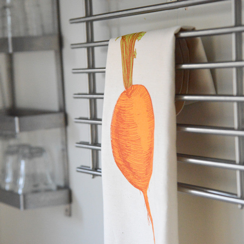 Orange Swede tea towel by Lottie Day – handmade cotton dish towel featuring root vegetable illustration, inspired by Norfolk allotments